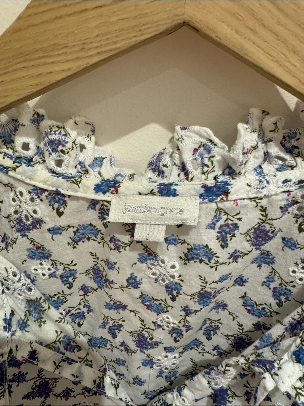 Ruffled V-Neck Sleeveless Blouse in Blue and White Floral - Picture 3 of 7